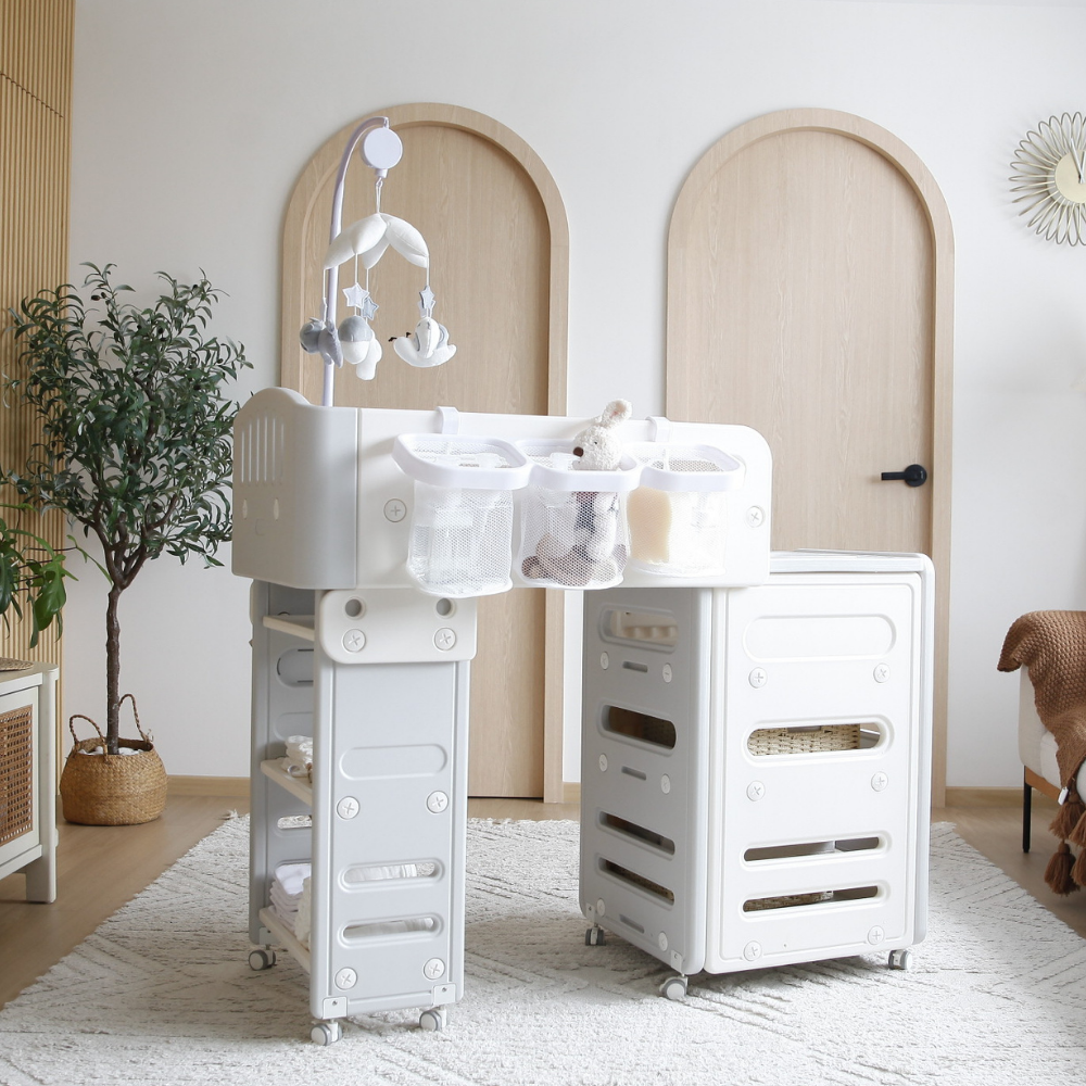 Modern baby changing station with storage and hanging organizers